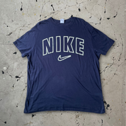 Vintage 90s Nike Spell out Single Stitch T-shirt in Navy