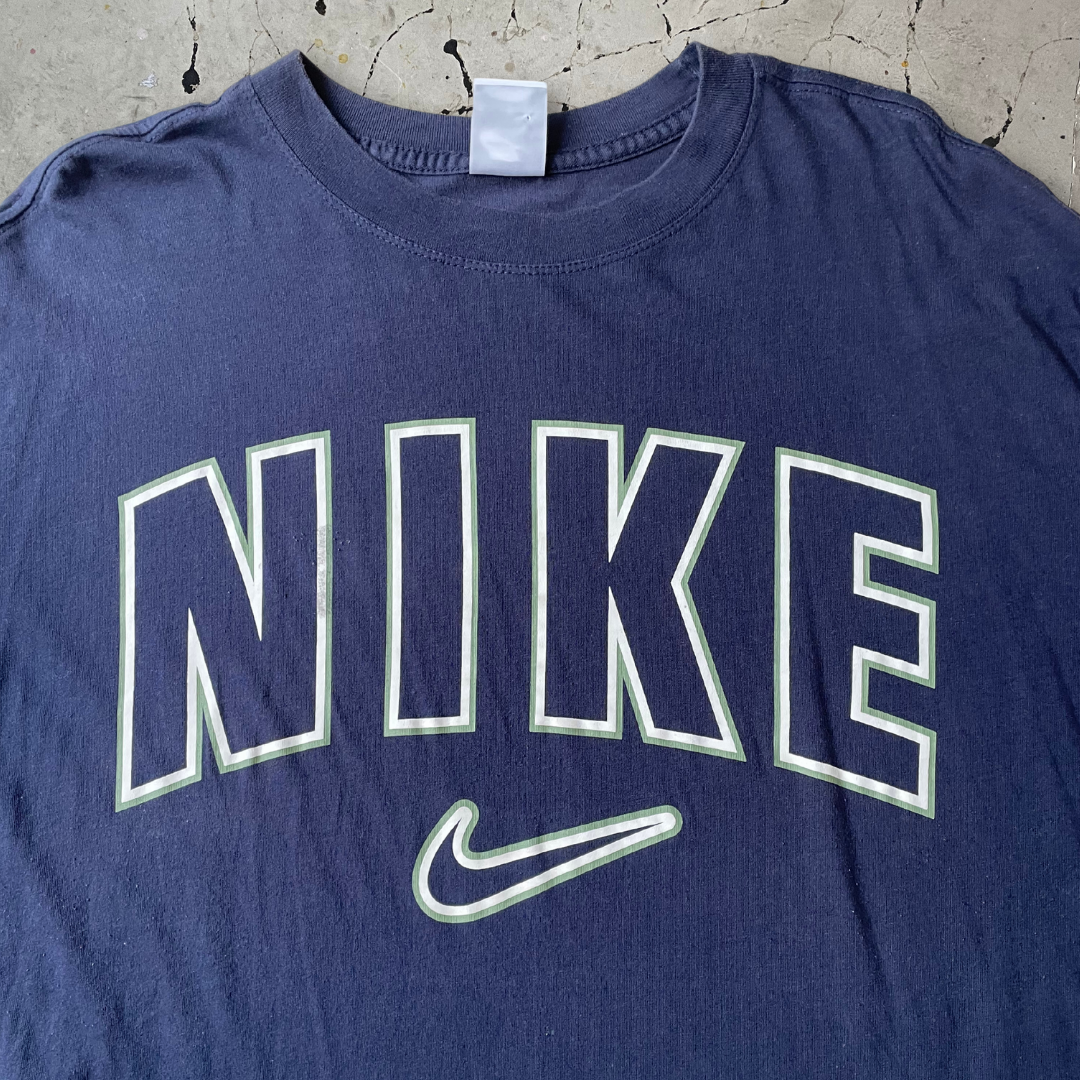 Vintage 90s Nike Spell out Single Stitch T-shirt in Navy